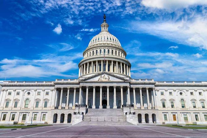 U.S. Capitol building with clear blue sky background.