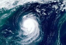 Satellite view of a massive hurricane over the ocean.