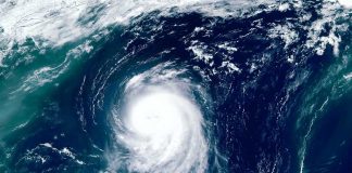 Satellite view of a massive hurricane over the ocean.