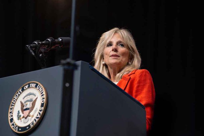 Person speaking at podium with Vice President seal.