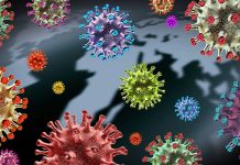 Colorful virus particles with a dark world map backdrop