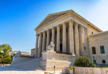 United States Supreme Court building with blue sky