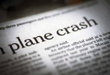 Newspaper headline about a plane crash story