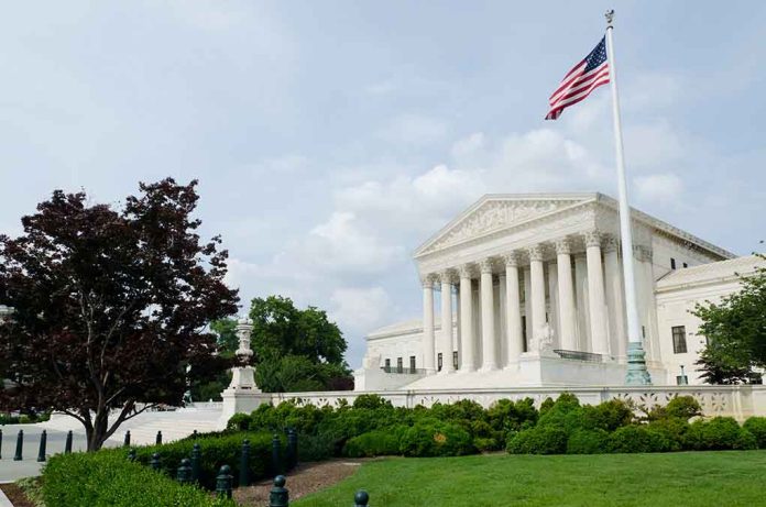 Government building with columns and American flag flying