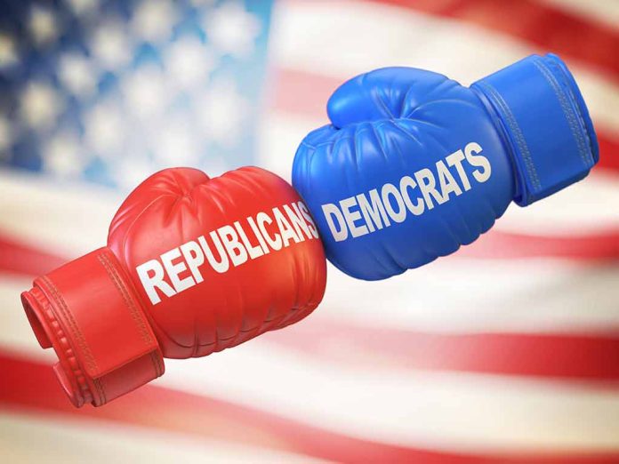 Red and blue boxing gloves with political party names.