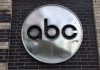 ABC logo on a brick wall.