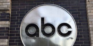 ABC logo on a brick wall.