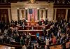 People gathering in United States legislative chamber meeting room