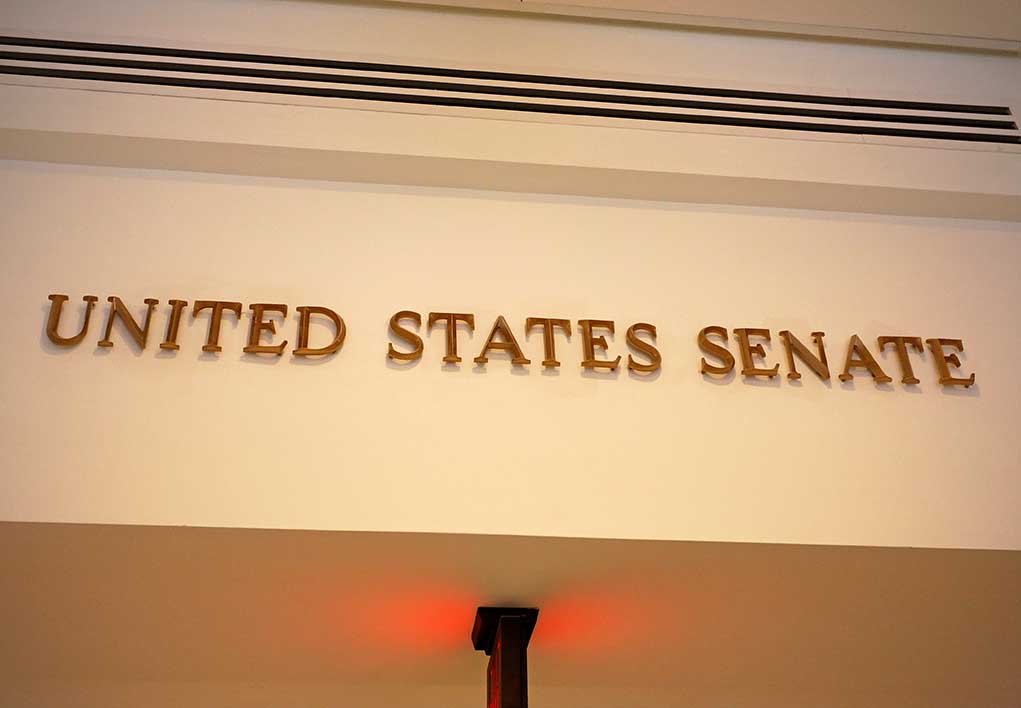United States Senate sign on wall