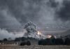 Large explosion with thick smoke on the battlefield