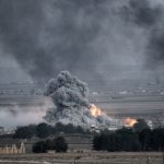 Large explosion with thick smoke on the battlefield