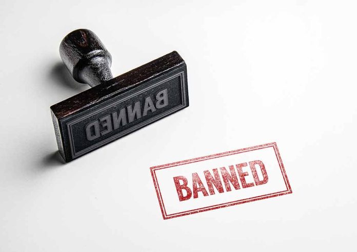 423625090 featured image Rubber stamp and red banned imprint on paper