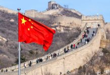 Chinese flag by the Great Wall of China