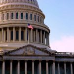 US Capitol building with American flag flying