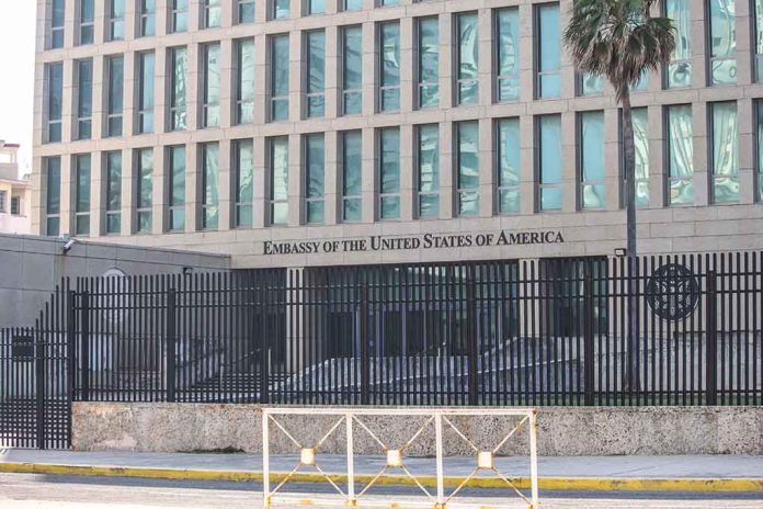 1830525032 featured image US Embassy building with fence and palm tree