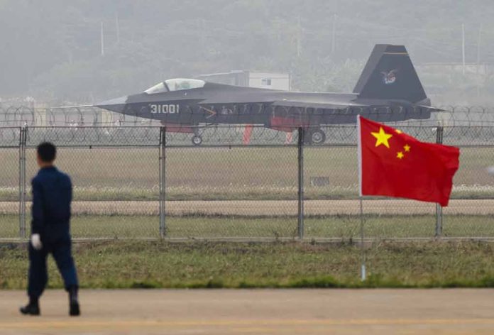 231381238 featured image Jet with "31001" marking behind barbed wire fence