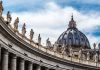 Large dome with statues on curved building