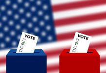 Ballots in boxes with American flag background