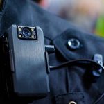 Body camera attached to a black uniform