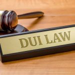 Gavel and DUI Law nameplate on desk