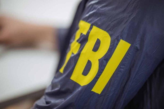 612694196 featured image Person wearing jacket with FBI in yellow letters