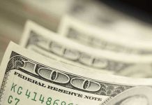 Close up of hundred-dollar bills