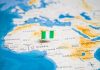 Flag pin marking Nigeria on Africa map