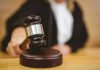 Judge striking gavel in a courtroom