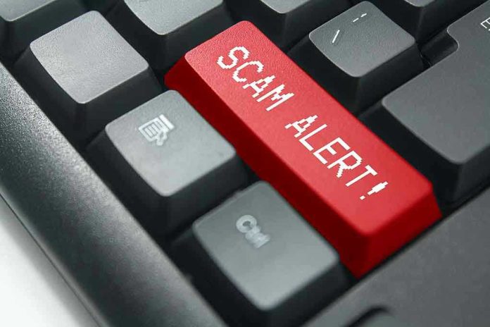 1013735752 Close-up of keyboard with red SCAM ALERT key.