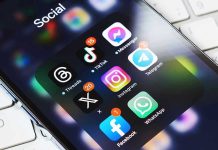 Smartphone showing social media app icons in a folder.