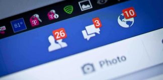 Close-up of a smartphone screen displaying Facebook notifications