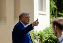 Trump’s Bold Pick – Tips Him For TOP JOB! Man in suit giving thumbs up.