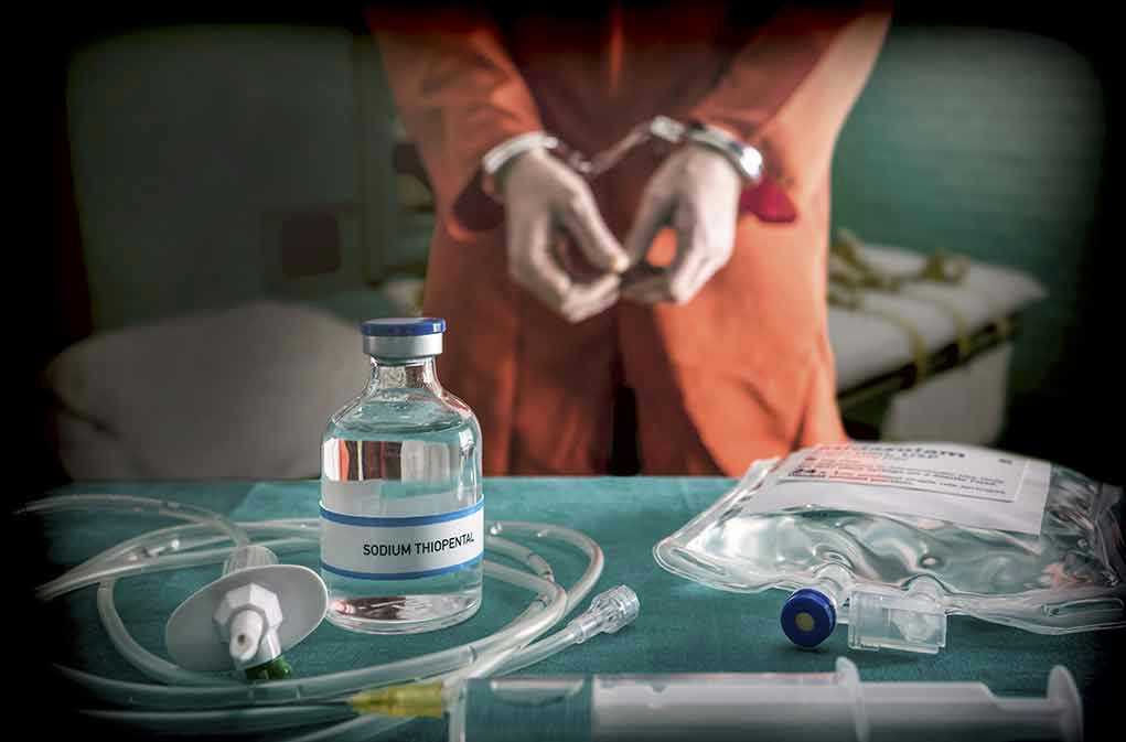 Vial labeled Sodium Thiopental near handcuffed person.
