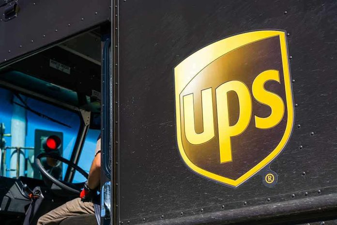 UPS delivery truck driver at traffic light