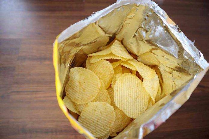 Open bag of ridged potato chips