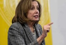 Pelosi ERUPTS – Calls Trump “Vile Creature” Woman speaking and pointing, wearing a plaid jacket.