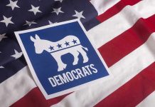 Dem Senator INDICTED – Explosive Sex Scandal! Democratic Party symbol on American flag background.