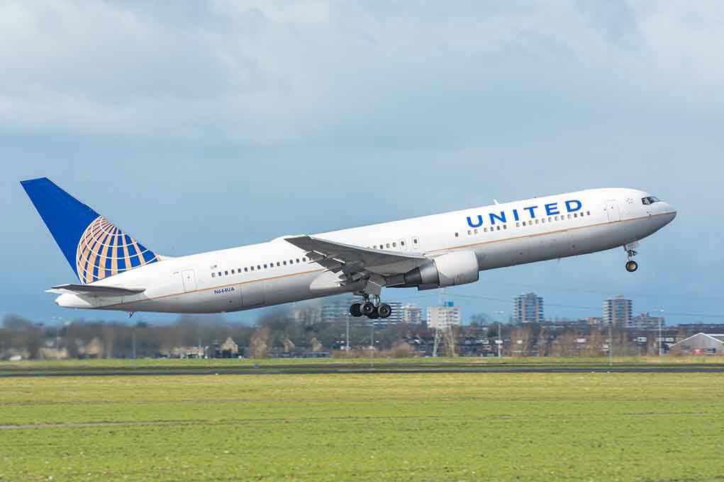United airplane taking off from a runway.