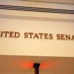 Bomb Threat Rocks Senator – Authorities SWOOP IN Sign displaying United States Senate in a government building
