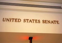 Bomb Threat Rocks Senator – Authorities SWOOP IN Sign displaying United States Senate in a government building