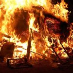 CRIMINAL Fire Kills 44 — Three ARRESTED A large fire engulfing debris at night