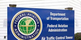 Sign for the Federal Aviation Administration at an air traffic control tower