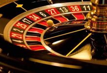 Unthinkable Crime: Sons Gamble After Killing Mom Close-up of roulette wheel with spinning ball.