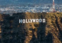 The Hollywood sign on a hillside.