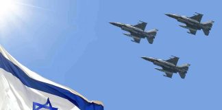 Israeli flag with three fighter jets in flight.
