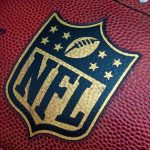 Close-up of an NFL football with the logo prominently displayed