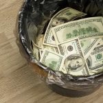 Ridiculous $239M Spent On PRISON Spa Trash bin filled with one hundred dollar bills.