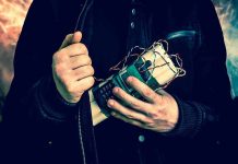 Convicted BOMBER Running for Office in UK Person holding a homemade explosive device.