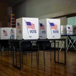 Supreme Court Could INVALIDATE Millions of Votes Voting booths set up in a room.