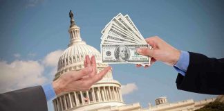 FEMA Covid Cash Scandal Hits Congress Hands exchanging money in front of Capitol building.